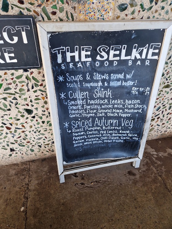 Chalkboard menu at Selkie Seafood Bar listing Cullen Skink and Spiced Autumn Veg soups.